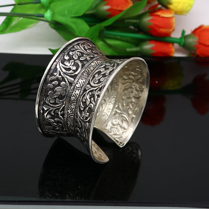 Adjustable 925 sterling silver tribal cuff bracelet with ethnic boho design, ideal for wedding or Navratri jewelry.