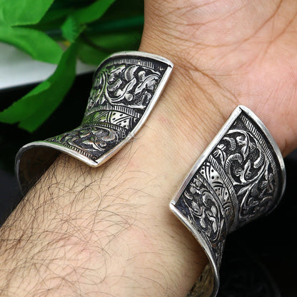 Sterling silver tribal cuff bracelet with adjustable design, ethnic boho style perfect for wedding and Navratri jewelry.