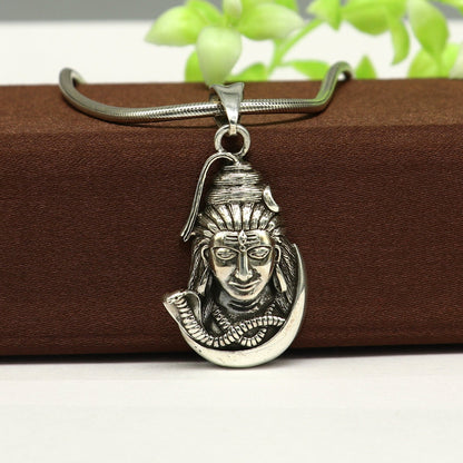 925 sterling silver Lord Shiva pendant from TRIBAL ORNAMENTS, unisex designer Hindu idol jewelry with intricate detailing.