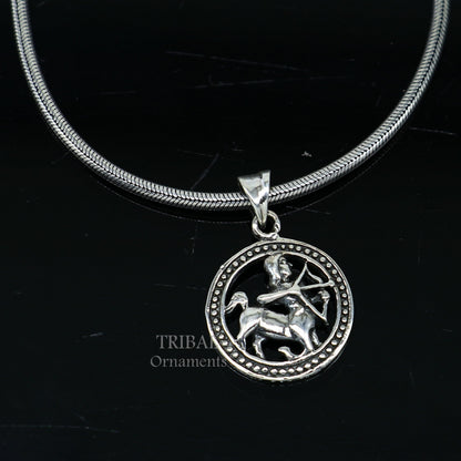 Sterling silver Sagittarius zodiac pendant featuring Dhanu Rashi symbol, ethnic jewelry, intricate tribal design.
