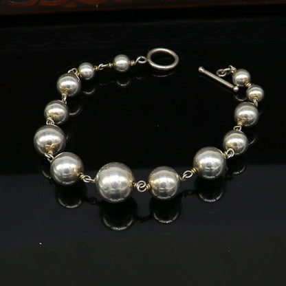 Sterling silver beaded bracelet by TRIBAL ORNAMENTS, unisex personalized belly dance jewelry with customizable beads.