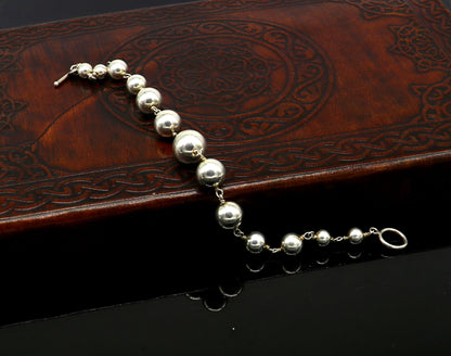 Sterling silver beaded customized bracelet by TRIBAL ORNAMENTS, stylish unisex jewelry perfect for gifting and belly dance accessories.