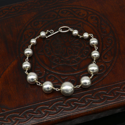 Sterling silver beaded customized bracelet by TRIBAL ORNAMENTS, unisex stylish jewelry with personalized design for belly dance or gifting.