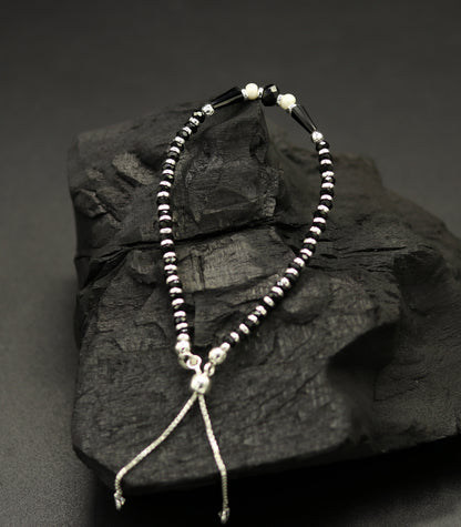 Sterling silver beaded bracelet with black onyx stone and charm, adjustable jewelry for girls by TRIBAL ORNAMENTS.