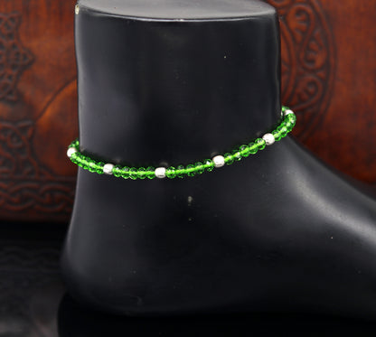 Sterling silver beads and semi-precious green stone thread anklet by TRIBAL ORNAMENTS, stylish handmade beaded ankle bracelet.