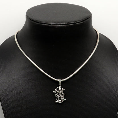Sterling silver Goddess Kali Maa pendant featuring tribal design, unisex personalized jewelry by Tribal Ornaments.