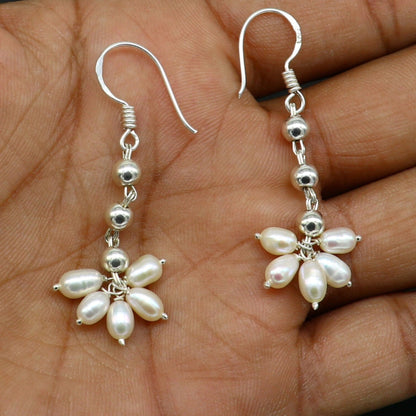 Sterling silver custom-made hoops earring with a white pearl drop, perfect for bridesmaids, by TRIBAL ORNAMENTS.