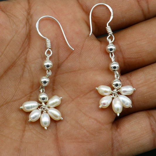 Sterling silver custom-made hoops earring with a white pearl drop, perfect for bridesmaids, by TRIBAL ORNAMENTS.