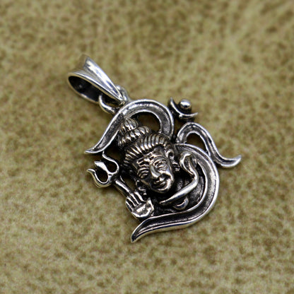 Sterling silver Lord Shiva pendant by TRIBAL ORNAMENTS, vintage unisex jewelry featuring intricate antique-style design.