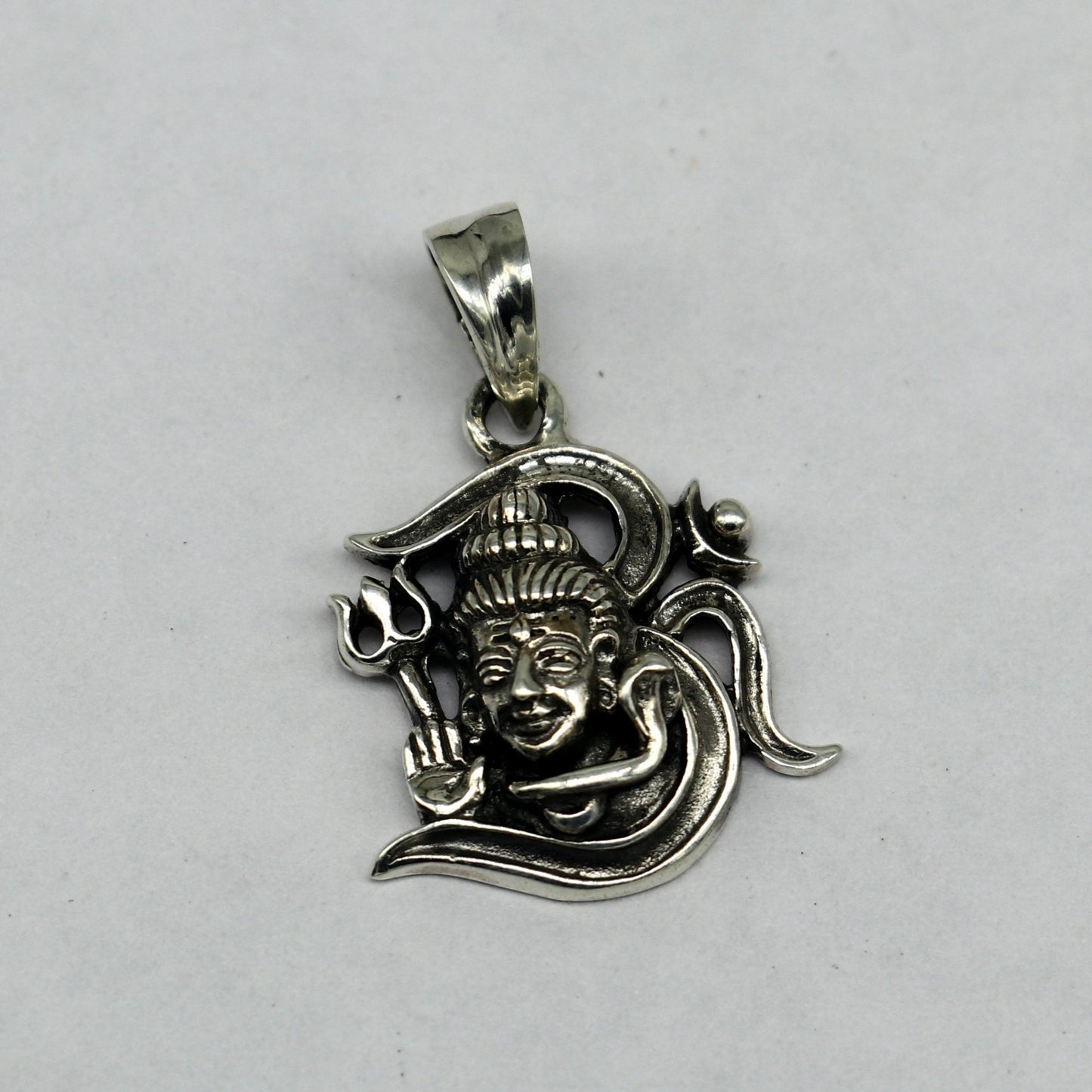 Sterling silver Lord Shiva pendant by TRIBAL ORNAMENTS featuring vintage antique design, unisex jewelry, perfect for gifting.