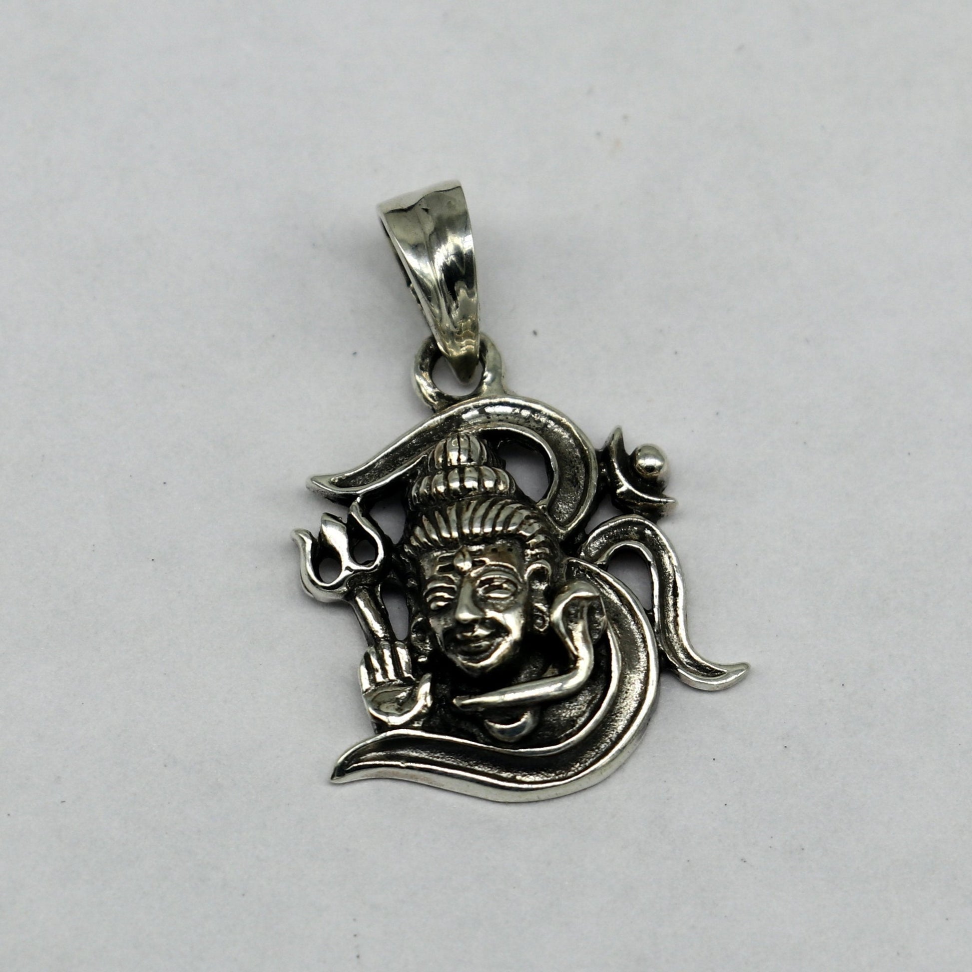 Sterling silver Lord Shiva pendant by TRIBAL ORNAMENTS featuring vintage antique design, unisex jewelry, perfect for gifting.