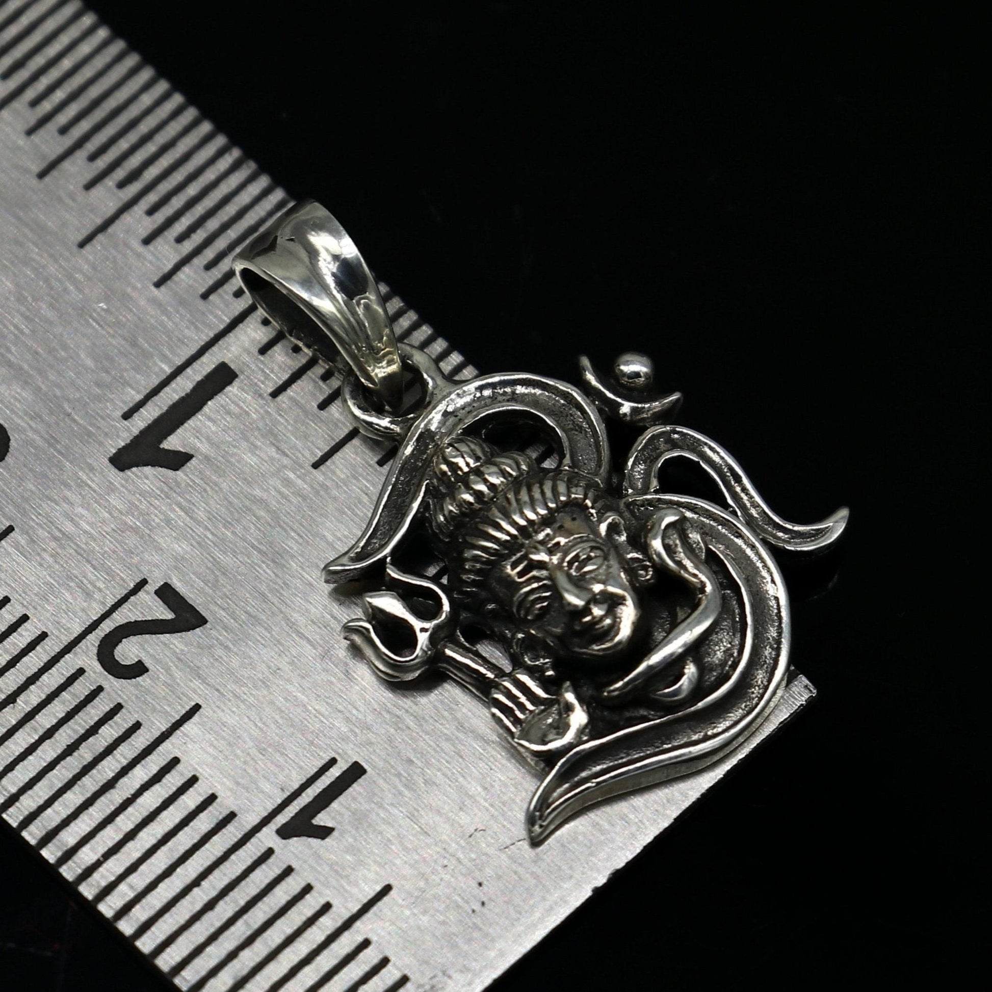 Sterling silver Lord Shiva pendant by Tribal Ornaments, vintage unisex jewelry with intricate design and antique style.