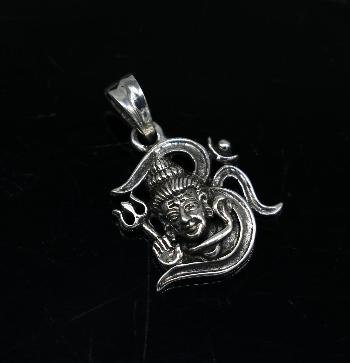 Sterling silver Lord Shiva pendant by TRIBAL ORNAMENTS featuring intricate vintage design, unisex jewelry for gifting or personal wear.