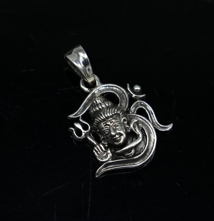 Sterling silver Lord Shiva pendant by TRIBAL ORNAMENTS featuring intricate vintage design, unisex jewelry for gifting or personal wear.
