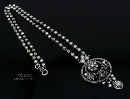 Sterling silver beaded chain necklace with tribal charm pendant, 24 inches, featuring ethnic jewelry design by TRIBAL ORNAMENTS.