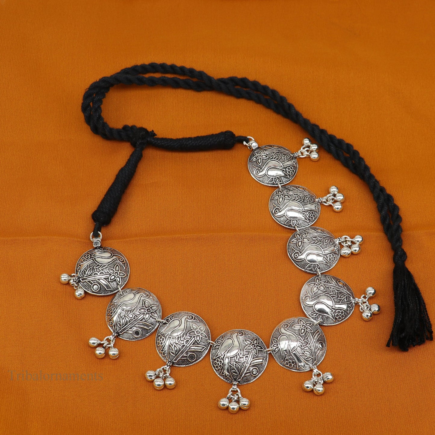 Sterling silver vintage-style bird design charm necklace, tribal-inspired choker with ethnic belly dance jewelry details.