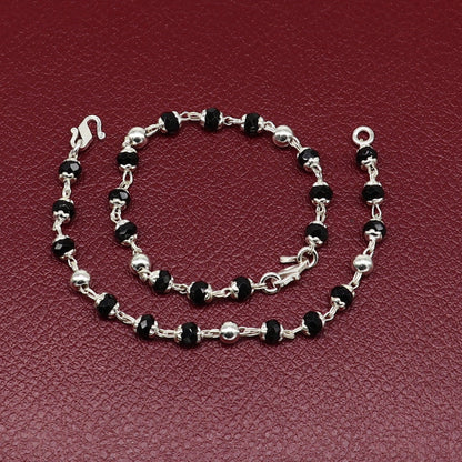 Sterling silver Nazariya bracelet with black beads, designed to protect from evil eyes, stylish jewelry for newborns in India