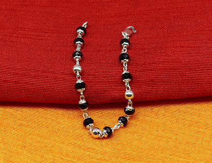 925 sterling silver Nazariya bracelet with black beads, designed to protect from evil eyes, suitable for newborns and stylish jewelry.