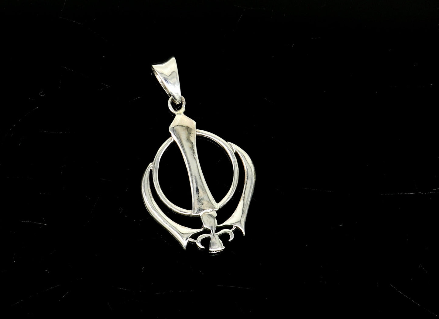 Sterling silver Khalsa Waheguru symbol pendant with customized design, featuring intricate tribal ornament details.