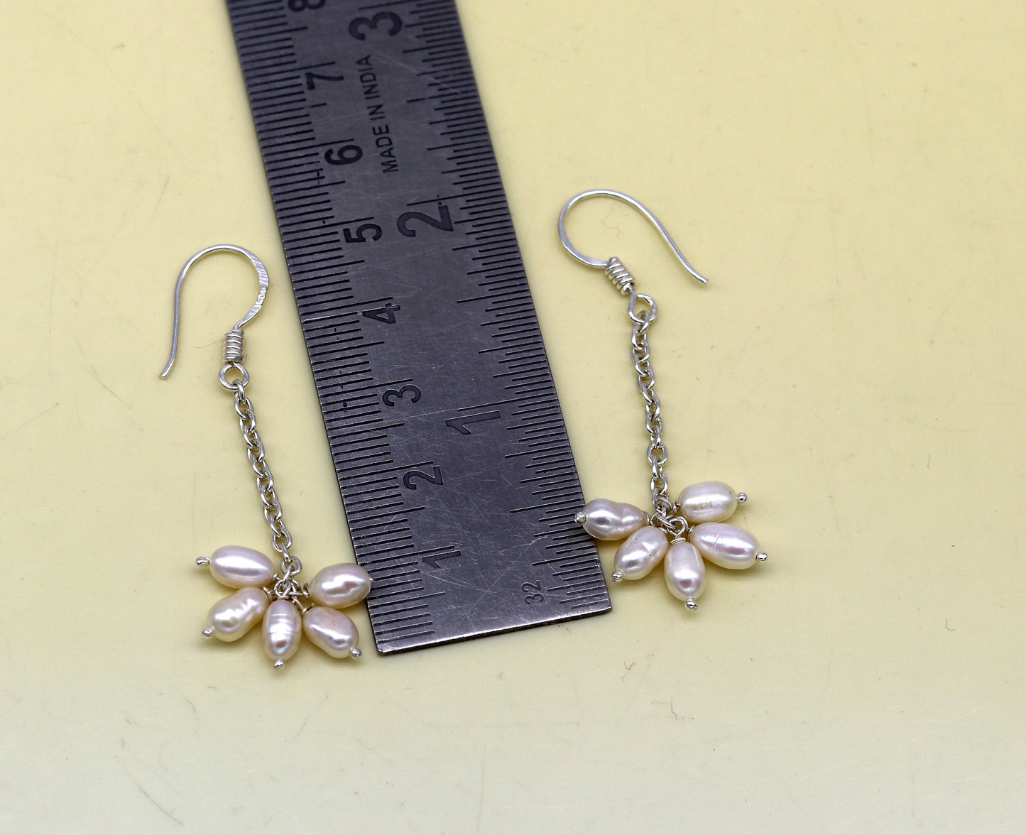 Stylish 925 sterling silver hoops earrings with 4mm freshwater pearl, designed for bridesmaids by TRIBAL ORNAMENTS.
