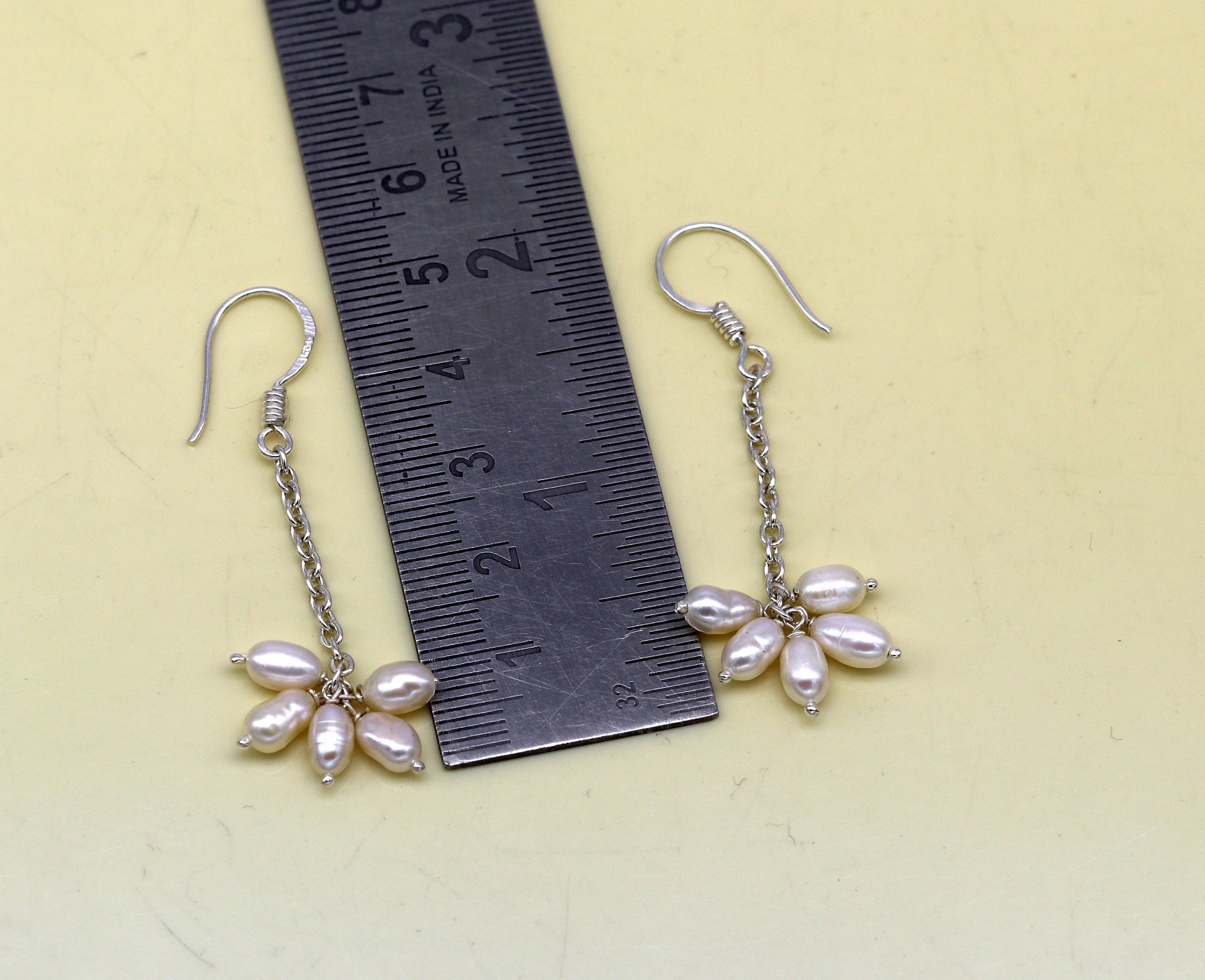 Stylish 925 sterling silver hoops earrings with 4mm freshwater pearl, designed for bridesmaids by TRIBAL ORNAMENTS.