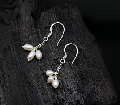 Sterling silver hoop earrings with tiny freshwater pearls, stylish and customized, perfect for bridesmaids and special occasions.