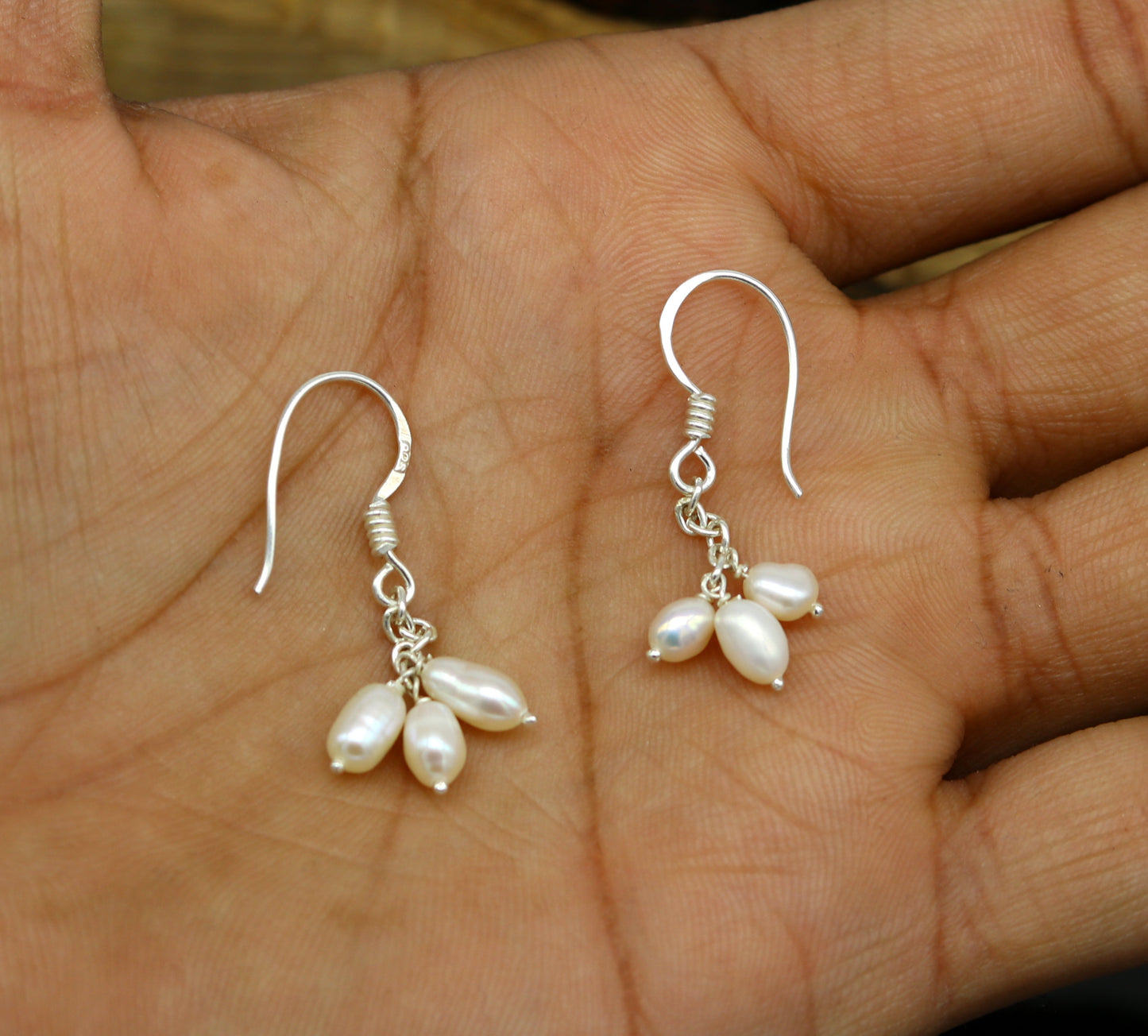 Sterling silver custom fancy hoop earrings with tiny freshwater pearls, stylish and elegant for bridesmaids or special occasions.