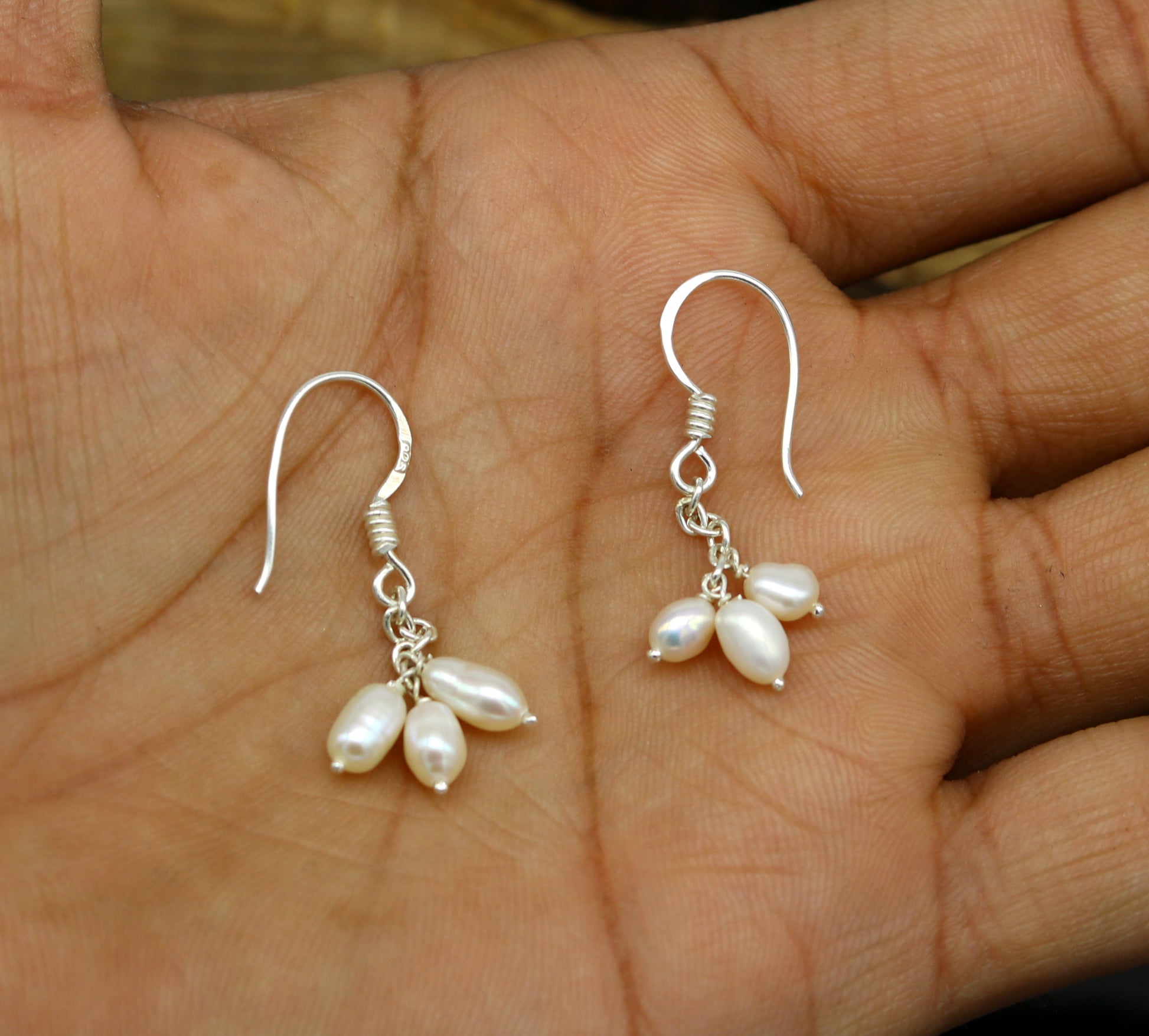 Sterling silver custom fancy hoop earrings with tiny freshwater pearls, stylish and elegant for bridesmaids or special occasions.