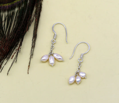 Sterling silver customized fancy hoop earrings with tiny freshwater pearls, stylish and perfect for bridesmaids and special occasions.