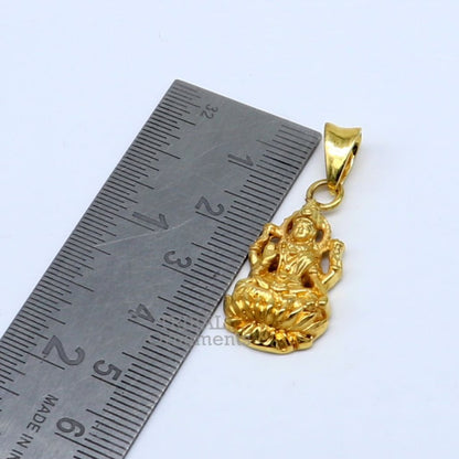 Sterling silver Goddess Laxmi pendant with gold polish, stylish unisex jewelry by TRIBAL ORNAMENTS, featuring intricate design.