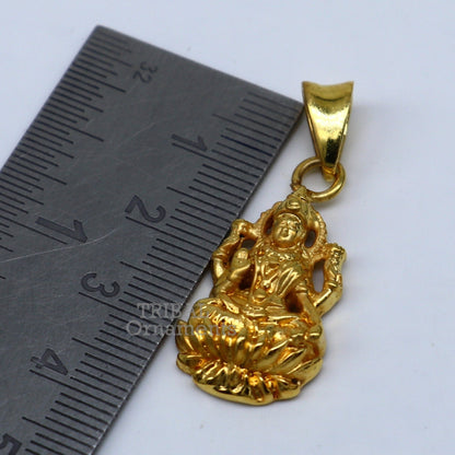 Sterling silver Goddess Laxmi pendant with gold polish, stylish unisex jewelry by TRIBAL ORNAMENTS, featuring detailed design.