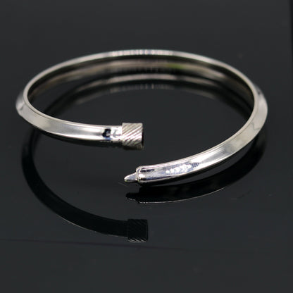 Sterling silver customized bangle bracelet with shiny, stylish, flexible design, tribal jewelry by TRIBAL ORNAMENTS.