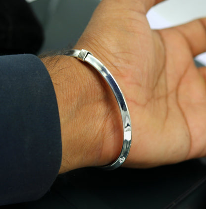 Shiny 925 sterling silver customizable tribal bangle bracelet with a sleek, flexible design from Tribal Ornaments.