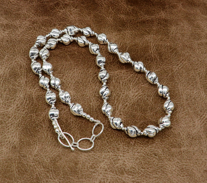 Sterling silver vintage beaded necklace by TRIBAL ORNAMENTS, stylish wedding jewelry, customized design, perfect for brides.