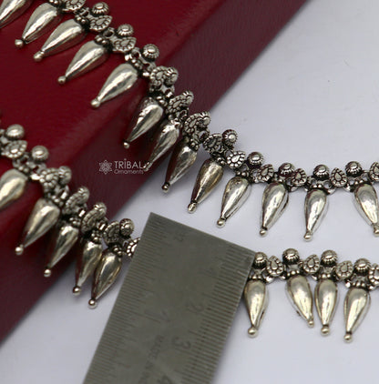 Sterling silver dangling bells charm ankle bracelet with attractive bells, trendy foot anklet for Garba dance by TRIBAL ORNAMENTS.