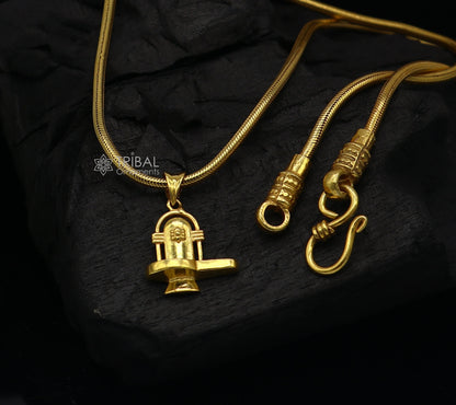 Sterling silver Lord Shiva Lingam pendant with gold polish, Hindu religious jewelry, unisex locket for spiritual gifting.