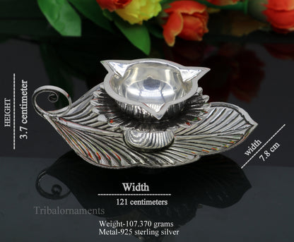 925 sterling silver Divine oil lamp with vintage tree leaf design, 3-joth puja lamp from Tribal Ornaments, ideal for gifting or religious rituals.