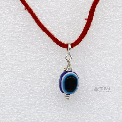925 Sterling silver evil eye pendant with drop dangle design, handmade jewelry for girls and kids by Tribal Ornaments.