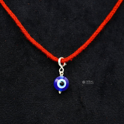 Sterling silver evil eye pendant for kids, handcrafted drop dangle jewelry with intricate design by TRIBAL ORNAMENTS.
