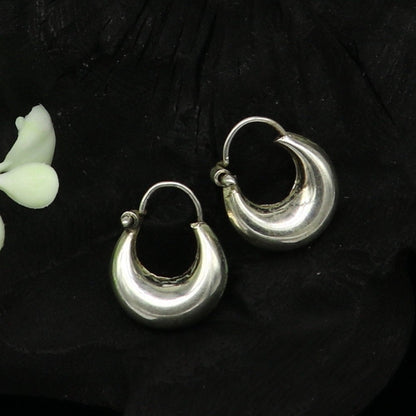 Sterling silver traditional Indian-style hoops earring by TRIBAL ORNAMENTS, lightweight and unisex design with intricate craftsmanship.
