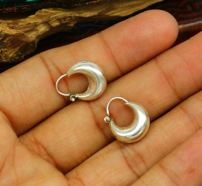 Sterling silver traditional Indian-style hoops earring by TRIBAL ORNAMENTS, lightweight unisex design with intricate craftsmanship.