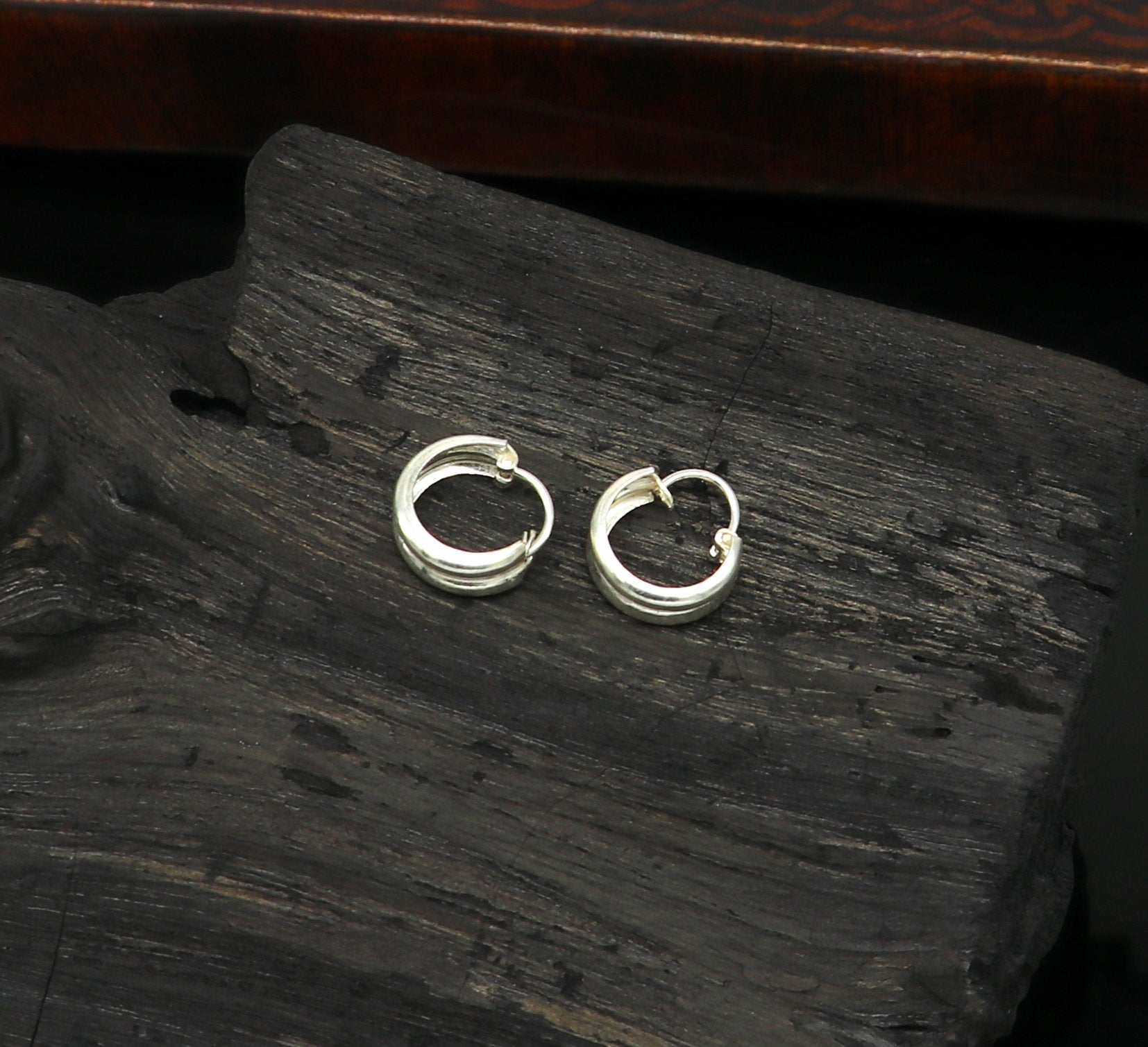 Sterling silver traditional Indian-style hoops earrings by Tribal Ornaments, lightweight, unisex, customizable jewelry for men and women.