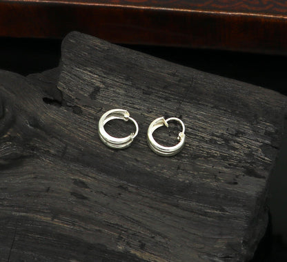 Sterling silver traditional Indian-style hoops earrings by Tribal Ornaments, lightweight, unisex, customizable jewelry for men and women.
