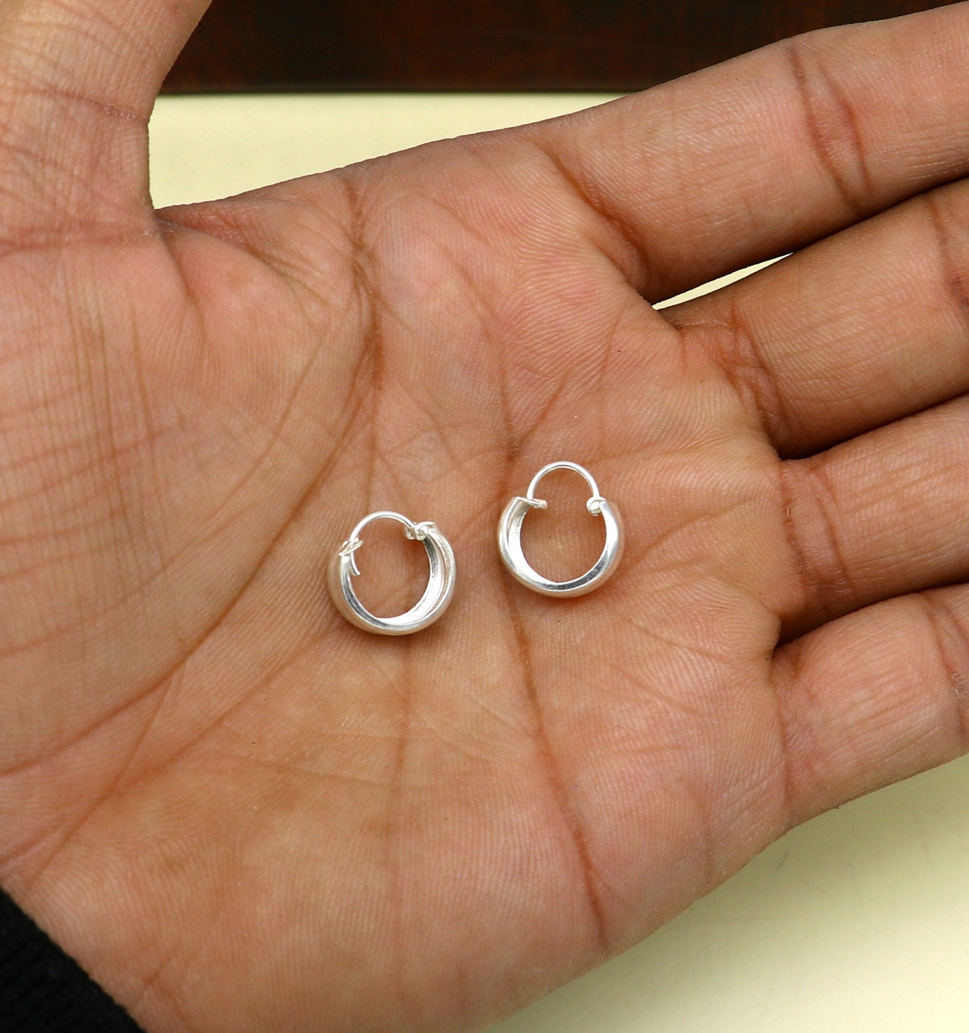 Sterling silver traditional Indian style hoops earring by TRIBAL ORNAMENTS, lightweight unisex jewelry with intricate design.