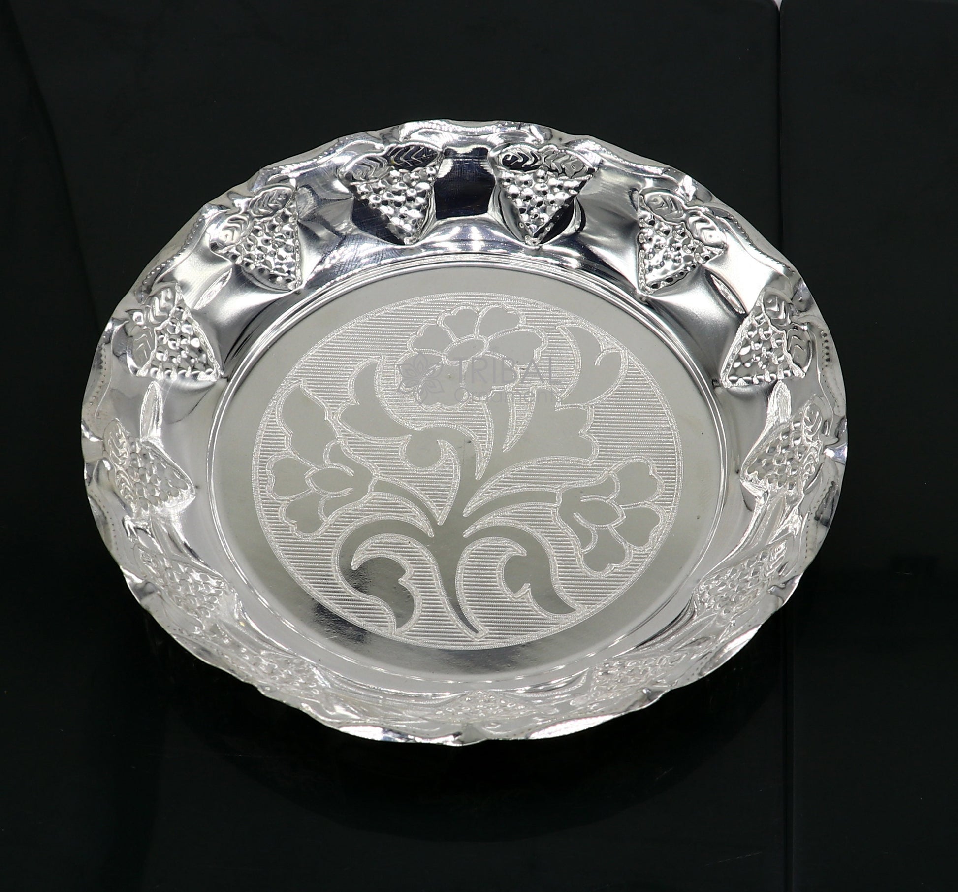 Sterling silver handcrafted puja tray with lightweight design, featuring traditional silver utensils and decorative silver thali.