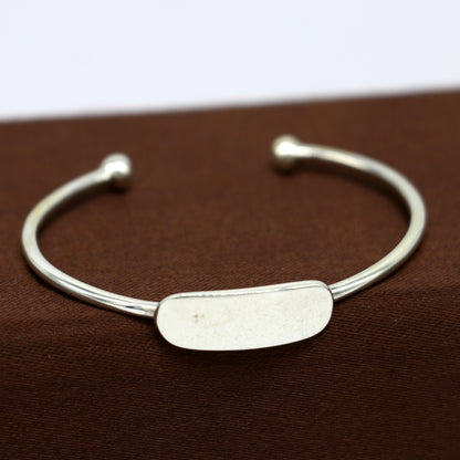 925 sterling silver baby bangle bracelet with a plain bright design, perfect for newborns and a meaningful gift from TRIBAL ORNAMENTS