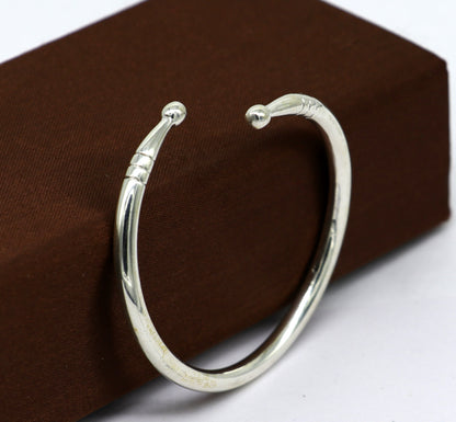 925 sterling silver newborn baby bangle with a plain bright design, adjustable baby bracelet or kada by Tribal Ornaments.