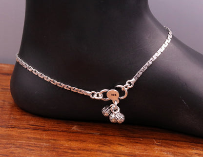 Sterling silver ankle bracelet with flower design, trendy charm feet bracelet by TRIBAL ORNAMENTS, stylish jewelry for ankles.