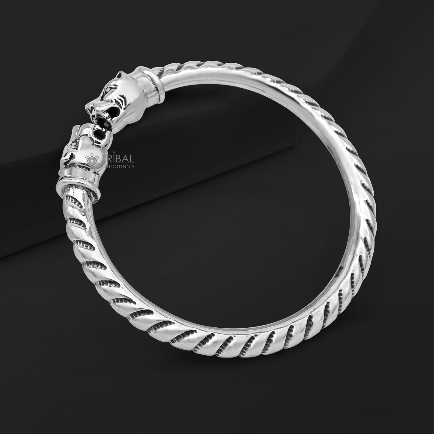 Sterling silver lion face kada bangle bracelet from Tribal Ornaments, featuring tribal tribal belly dance jewelry design.