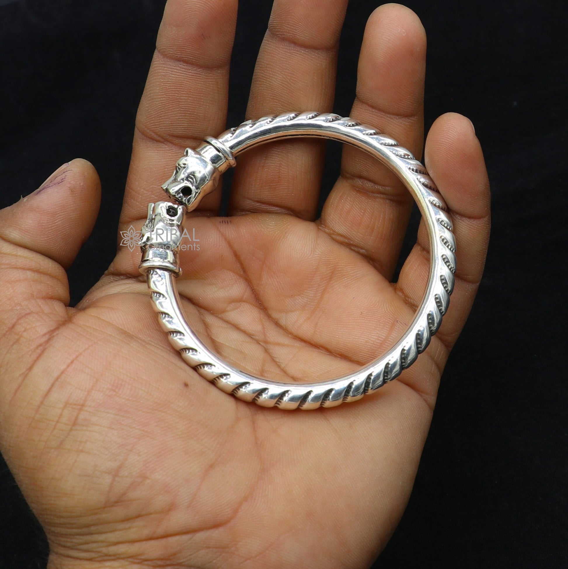 Sterling silver lion face kada bangle bracelet by Tribal Ornaments, featuring tribal belly dance jewelry with detailed lion design.